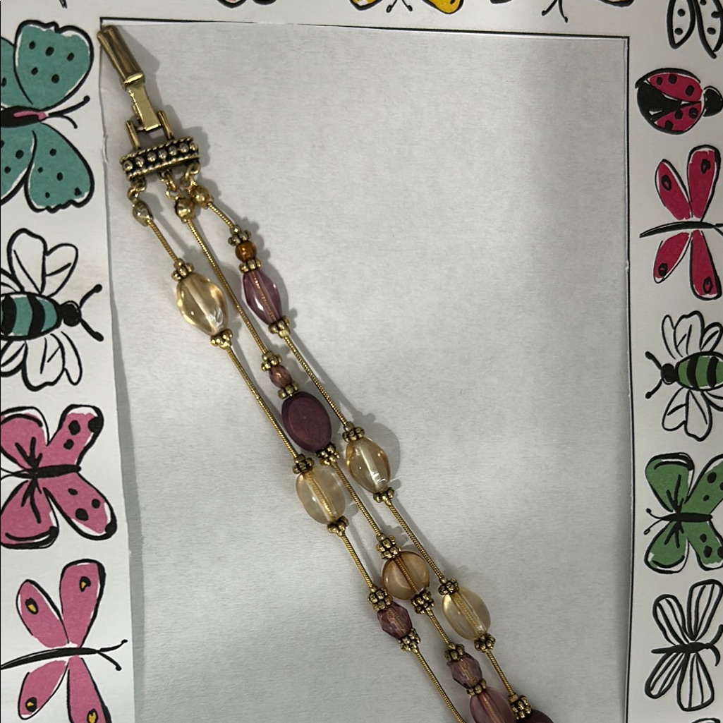 Elegant Gold And Purple Beaded Bracelet